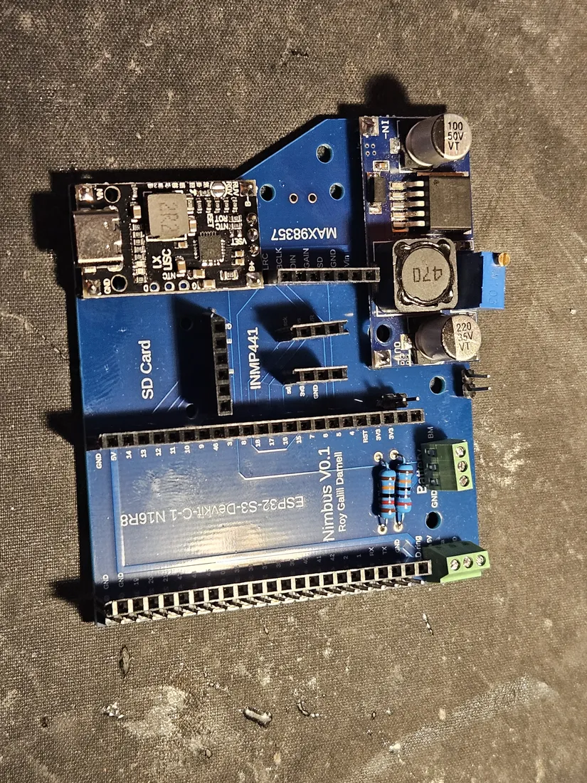 Carrier PCB, power side up, with the DC-DC LM2596 buck converter and the USB-C charger board mounted at the board edge